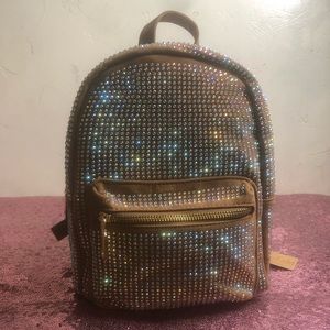 Glittery tan backpack